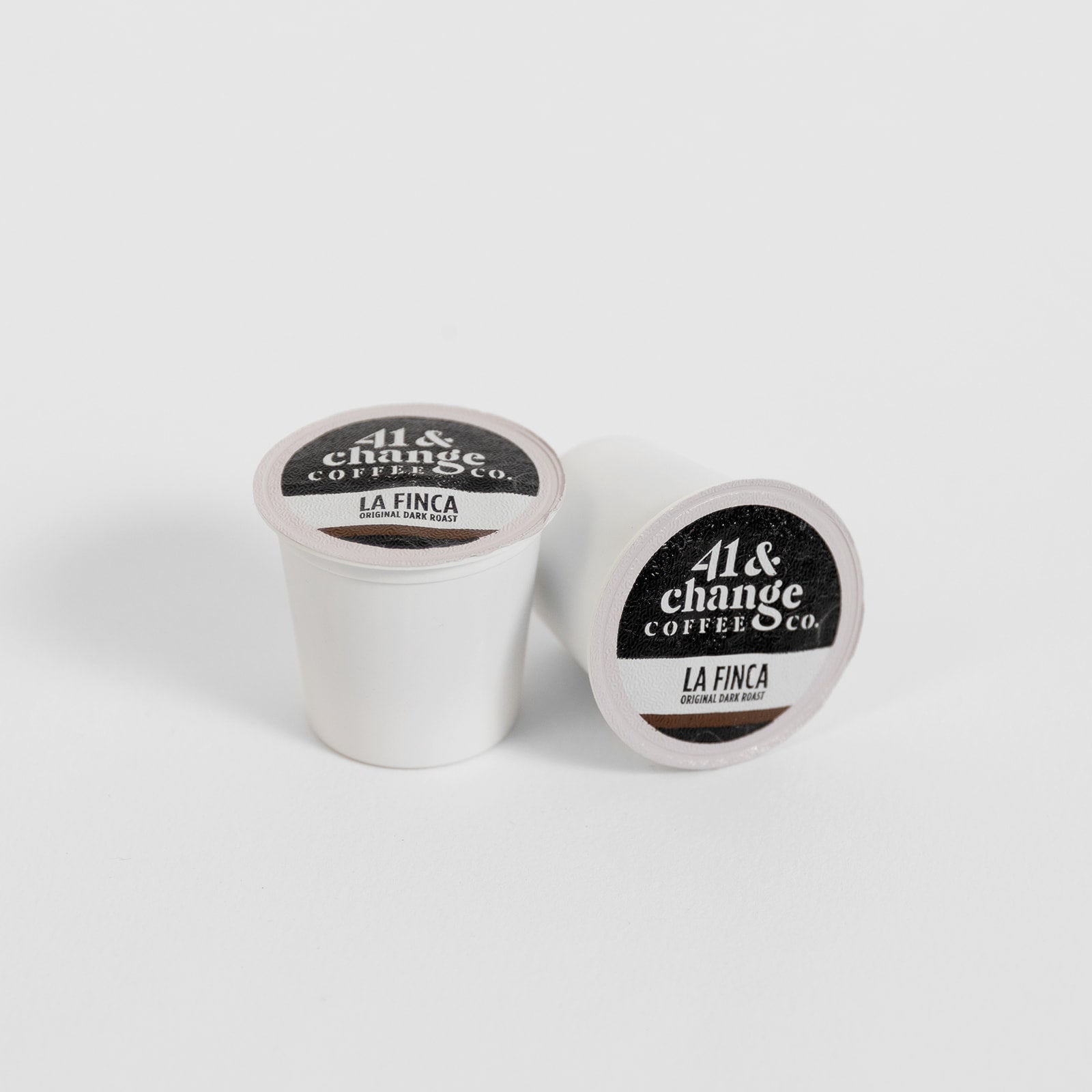 41&Change La Finca Dark Roast single-serve K-Cup pods, close-up front and back view